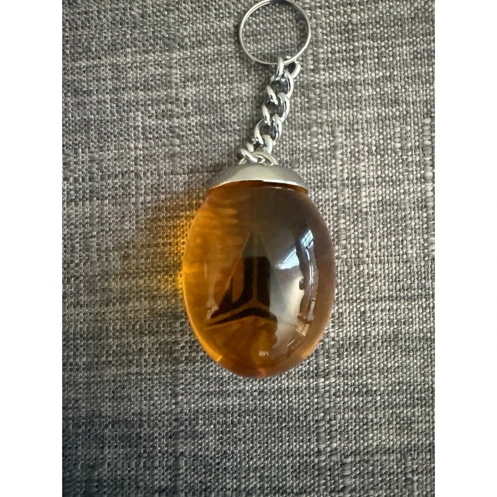 Jurassic park JA 3 Nike Keychain Amber Keychain Pendant